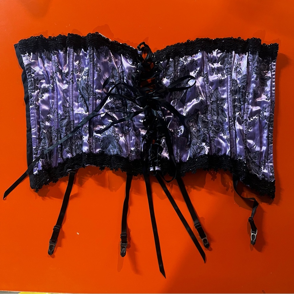 Purple and floral corset with garter straps and black lace detail